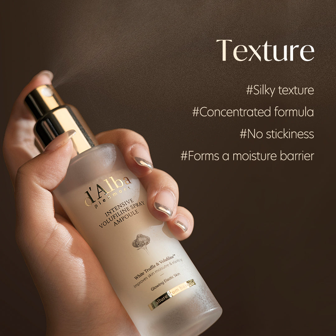 Hand holding the d'Alba Intensive Volufiline Spray Ampoule, silky concentrated texture